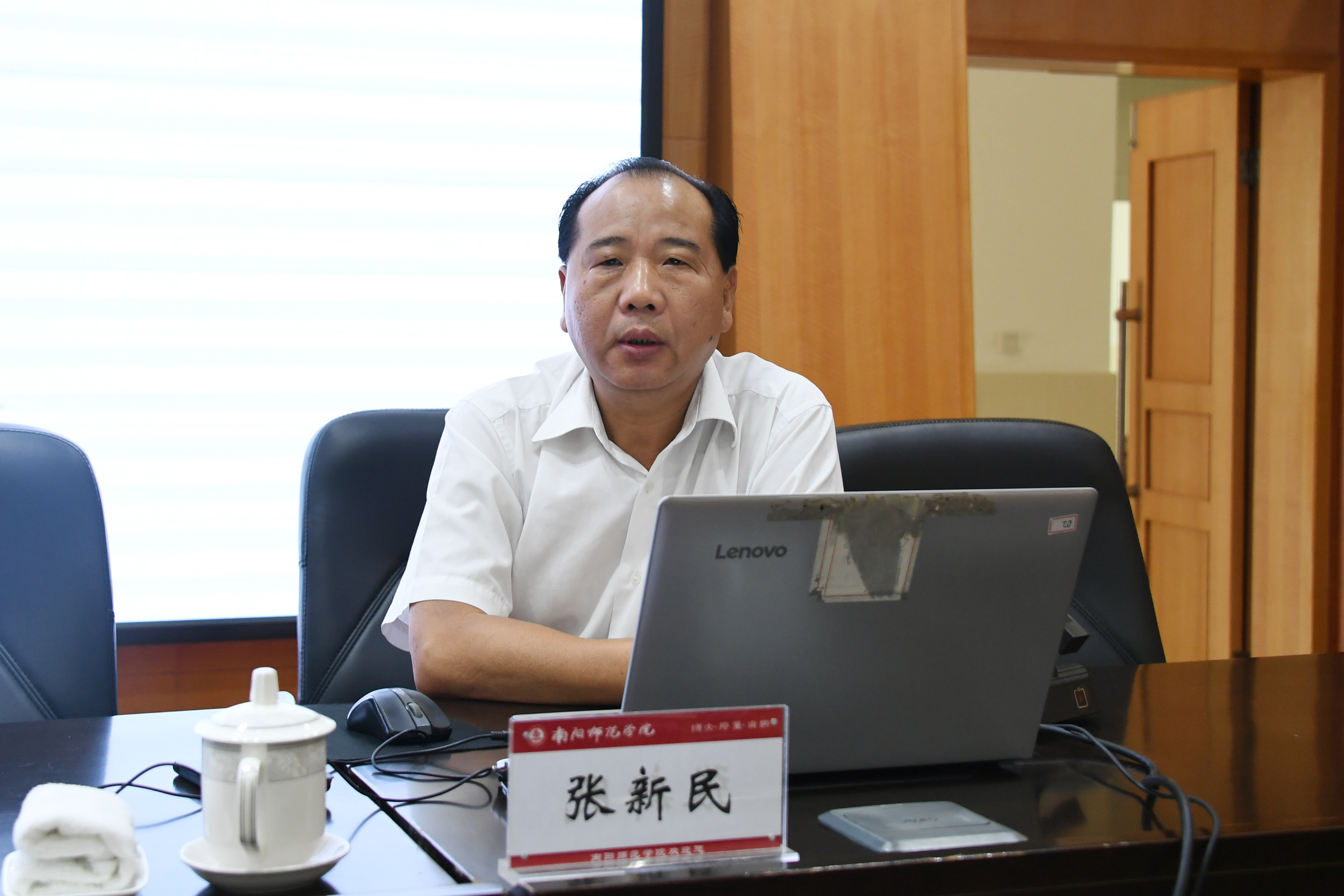 2.河南省教育评估中心副主任张新民作报告.jpg